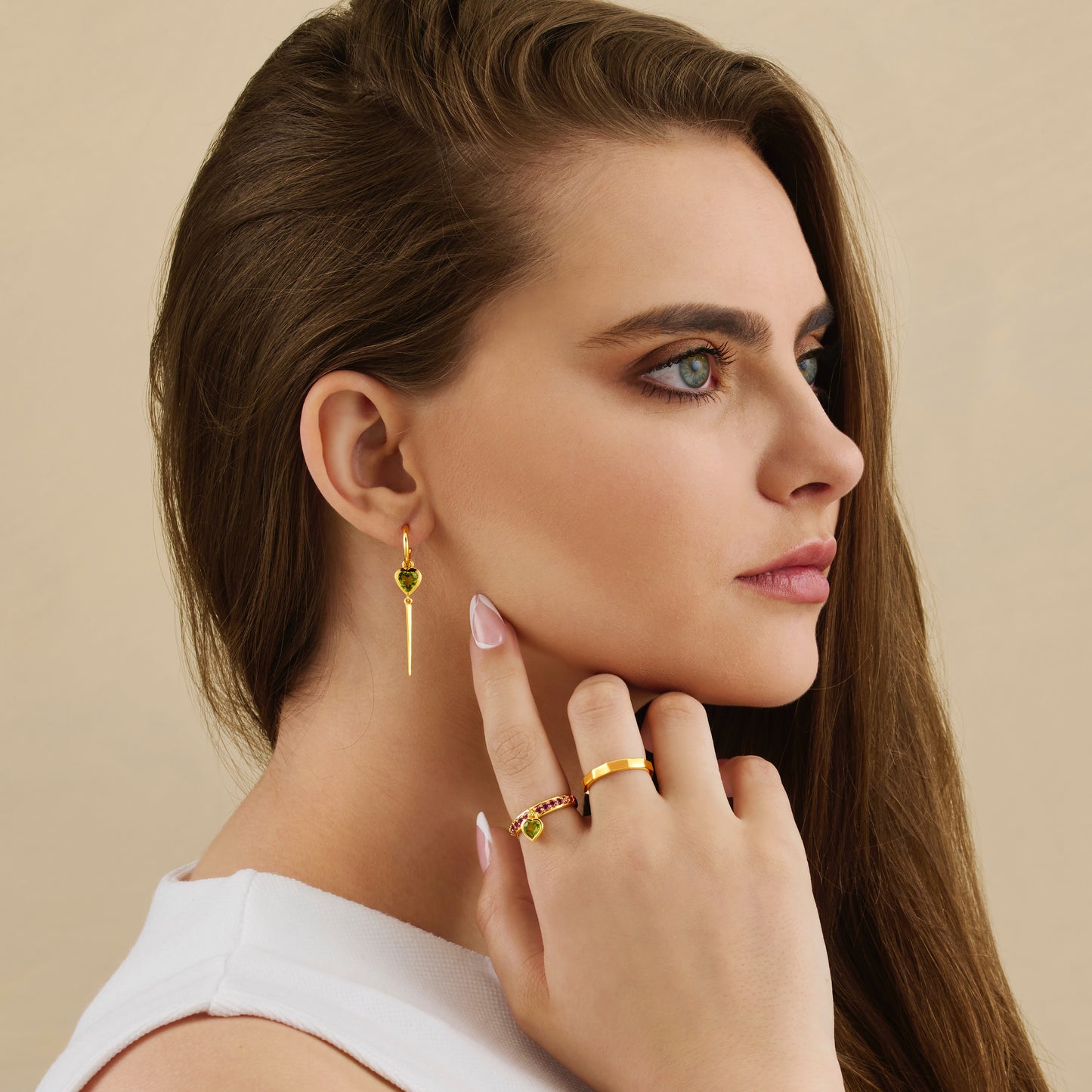 peridot heart drop earrings & ring set on model