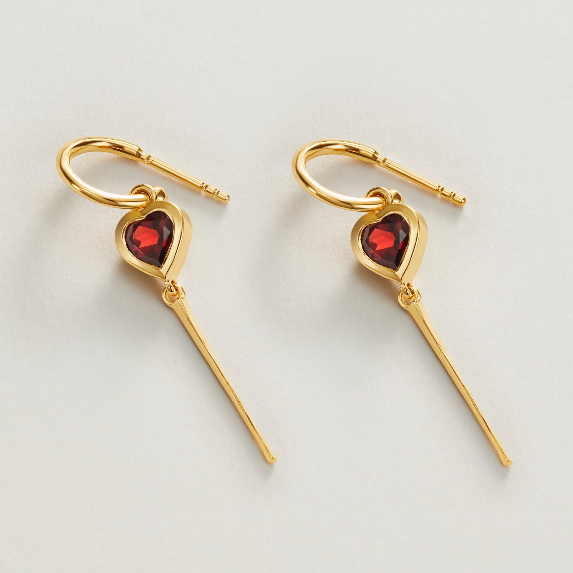 red garnet gemstone heart hoop drop earrings flatlay